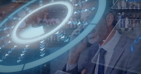 Holding smartphone, man in gray suit, dark tie speaking in lounge with HUD overlays, copy space