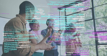 Working office tech wearing business holding phones and stylus pointing at glass wall with AR code