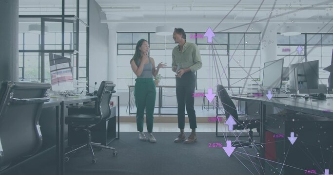 Discussing coworkers wearing biz-casual and checking tablet in open office with purple overlay - Powered by Adobe