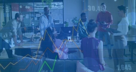 Leading presenter in business attire guiding seven staff discussing data in modern office, laptops