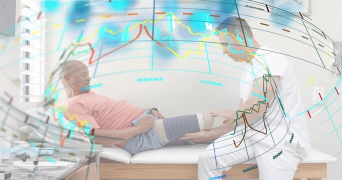 Kneeling therapist in scrubs feeling patient's knee with sleeve at table, pink tee, charts