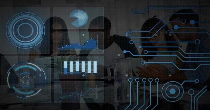 Discussing team in business shirts leaning at meeting table viewing laptop tablet plant overlays