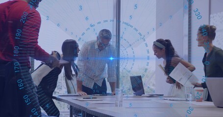 Obraz premium Leaning manager in checked shirt reviewing papers at office meeting room, with blue HUD overlay