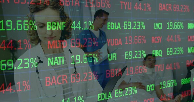 Reviewing tablet, doctor in white coat, stethoscope seeing patients in ward with red green tickers - Powered by Adobe