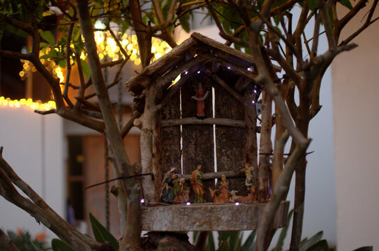 A simple, well-lit nativity display with detailed figurines and natural tones, showcasing a classic Christmas tradition in a clear and elegant style.