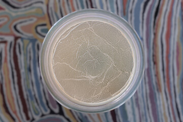 Kahm yeast is a harmless, harmless, surface-dwelling yeast that forms a thin, whitish film on ferments like sauerkraut, pickles, and kefir