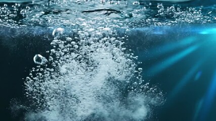 Underwater Ascension Bubbles Rising in Clear Water with Dynamic Light Rays Creating a Serene and Refreshing Visual Experience for Nature and Science Enthusiasts.