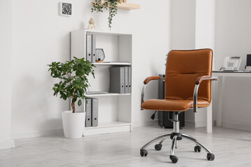 Office leather brown chair in interior of room, closeup