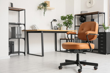 Comfortable leather brown chair in interior of office, closeup
