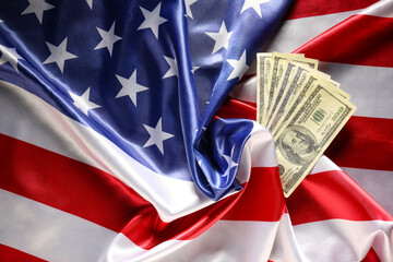 USA flag and dollar banknotes