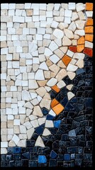 Close-up of a mosaic tile art piece with a gradient of colors, arranged on a black background.