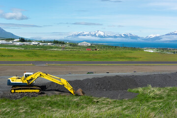 Excavator working at a construction site in Reykjanes peninsula, Iceland