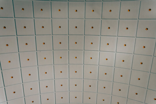 Ceramic tiles with golden stars in the interior of the room