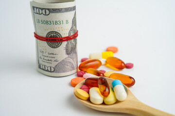Medicine prescription drugs cost concept, Pills on money dollars, healthcare expenses