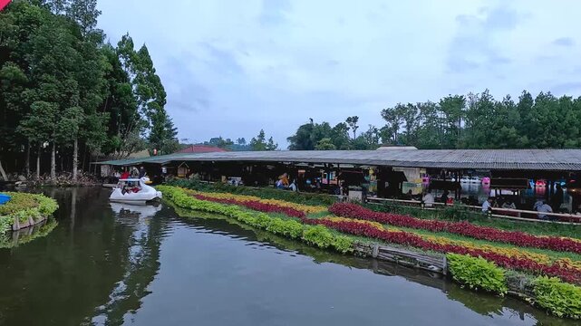 Families and friends are heading to Lembang Floating Market for a refreshing weekend getaway in the mountains always together, playing duck boat ride. Bandung, 10 August 2025