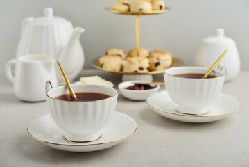 English Afternoon Tea  in elegant white porcelain cups