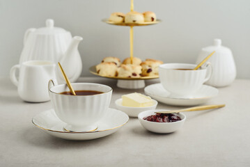 English Afternoon Tea  in elegant white porcelain cups
