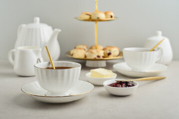 English Afternoon Tea  in elegant white porcelain cups