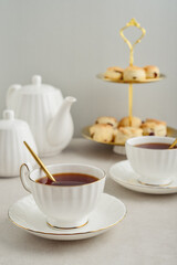 English Afternoon Tea  in elegant white porcelain cups