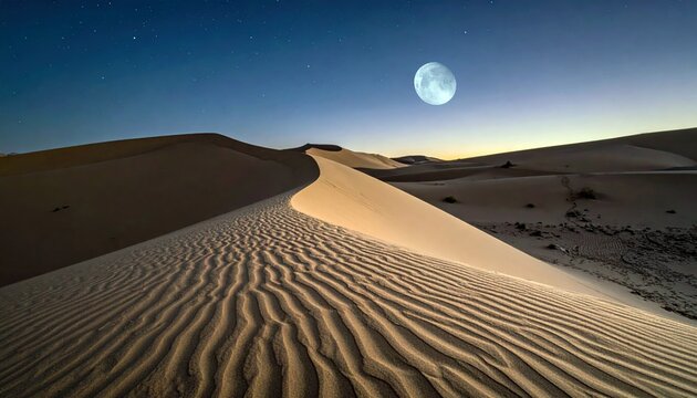 Panoramic view of sand dunes under a starry night sky with a full moon, creating a serene and peaceful atmosphere.