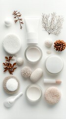 Top-down view of various skincare products, including creams, brushes, and a tube, alongside natural elements like branches and a pinecone, all arranged on a wh