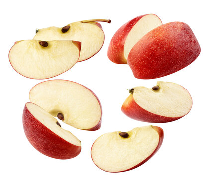 various fresh, crisp red apple slices and wedges isolated on a pure transparent background, showcasing the nutritious white flesh, red skin, and brown seeds for healthy concepts.