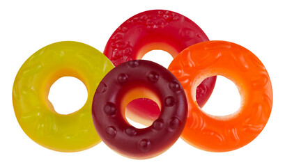 vibrant assortment of colorful fruit-flavored gummy rings stacked and grouped closely together,...