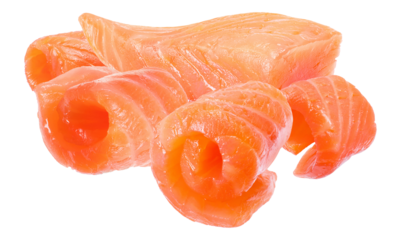 close-up photograph of fresh raw salmon slices beautifully rolled and arranged alongside a large, pristine fillet cut isolated on black.