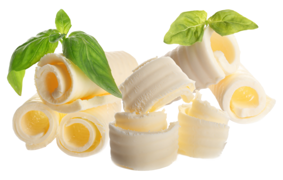 dynamic photograph of fresh, golden-yellow butter curls and textured rolls scattered and floating in mid-air, garnished with vibrant green basil leaves.