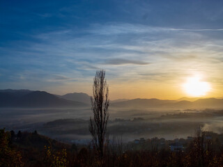 Abstract sunset landscape near Sarajevo with surreal colors and dramatic cloud formations, ideal for editorial and commercial use.