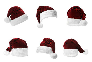 six red velvet santa claus hats displayed in various angles. christmas holiday symbol isolated on transparent background. realistic photograph.