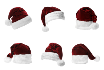 six red velvet santa claus hats displayed in various angles. christmas holiday symbol isolated on transparent background. realistic photograph.