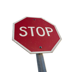 A close up view of a red and white stop sign against a black background outdoors
