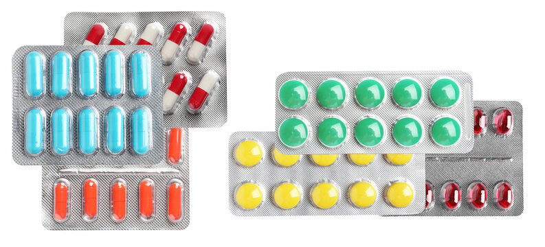 assortment of multi-colored medicine pills and capsules sealed in silver foil blister packs, symbolizing diverse pharmaceutical treatments, global healthcare, and modern drug distribution.