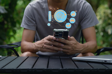 Young Man Using Smartphone Outdoors with Floating Digital Icons