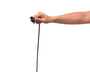 Close-up of a hand holding a black electric power cord plug isolated on transparent PNG.	
