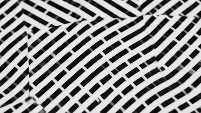 Abstract black and white diagonal line pattern texture.