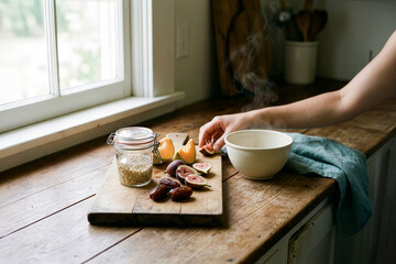 Healthy breakfast preparation in kitchen with natural light