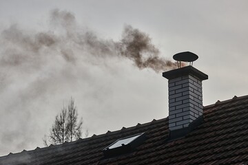 Smoking Chimney on a Roof