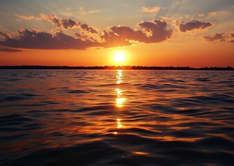 Golden sunset over rippled water