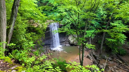Scenic Cucumber waterfalls aerial view in lush green Ohiopyle state park in Pennsylvania.