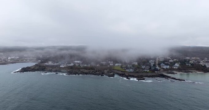 view over the ocean on a foggy day in ogunquit maine