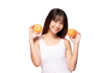 Asian Young woman holding two oranges smiling with casual tank top and healthy lifestyle vibe