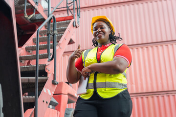 Female Engineer Giving Thumbs Up for Safe and Successful Operation, Happy Logistic Worker in Safety Gear Standing Confidently by Heavy Port Machinery, Supervisor Holding Tablet and Approving Work Flow