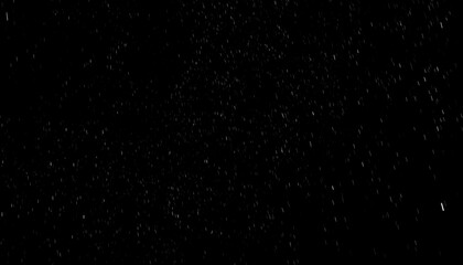 Obraz premium Black background filled with a speckled texture resembling a starry sky or gentle rainfall. Light dots and lines