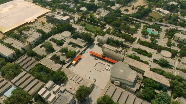 Aerial view showing NED University campus buildings and green spaces in Karachi