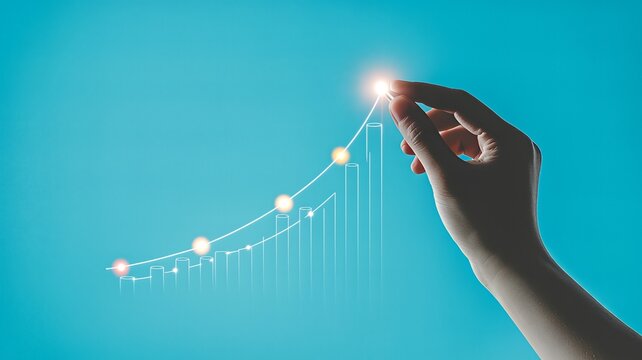 A hand points to the peak of a glowing upward trending graph against a vibrant blue background, symbolizing success and growth.