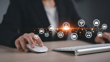 Businesswoman using computer with digital network and communication icons overlay