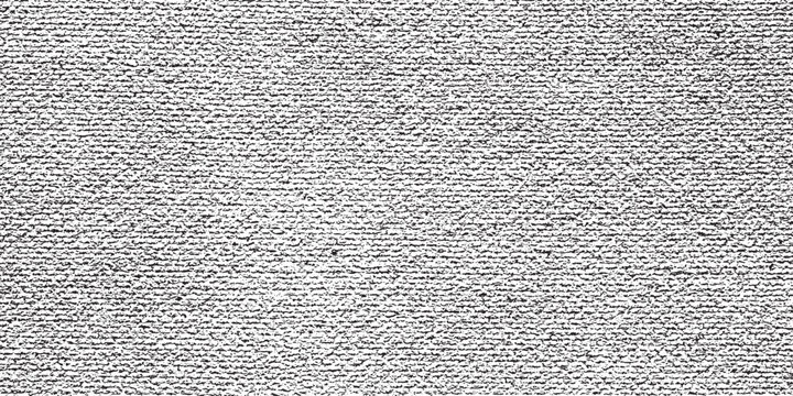 Close up of a textured fabric surface with a woven pattern.