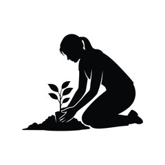 Woman planting seedling silhouette